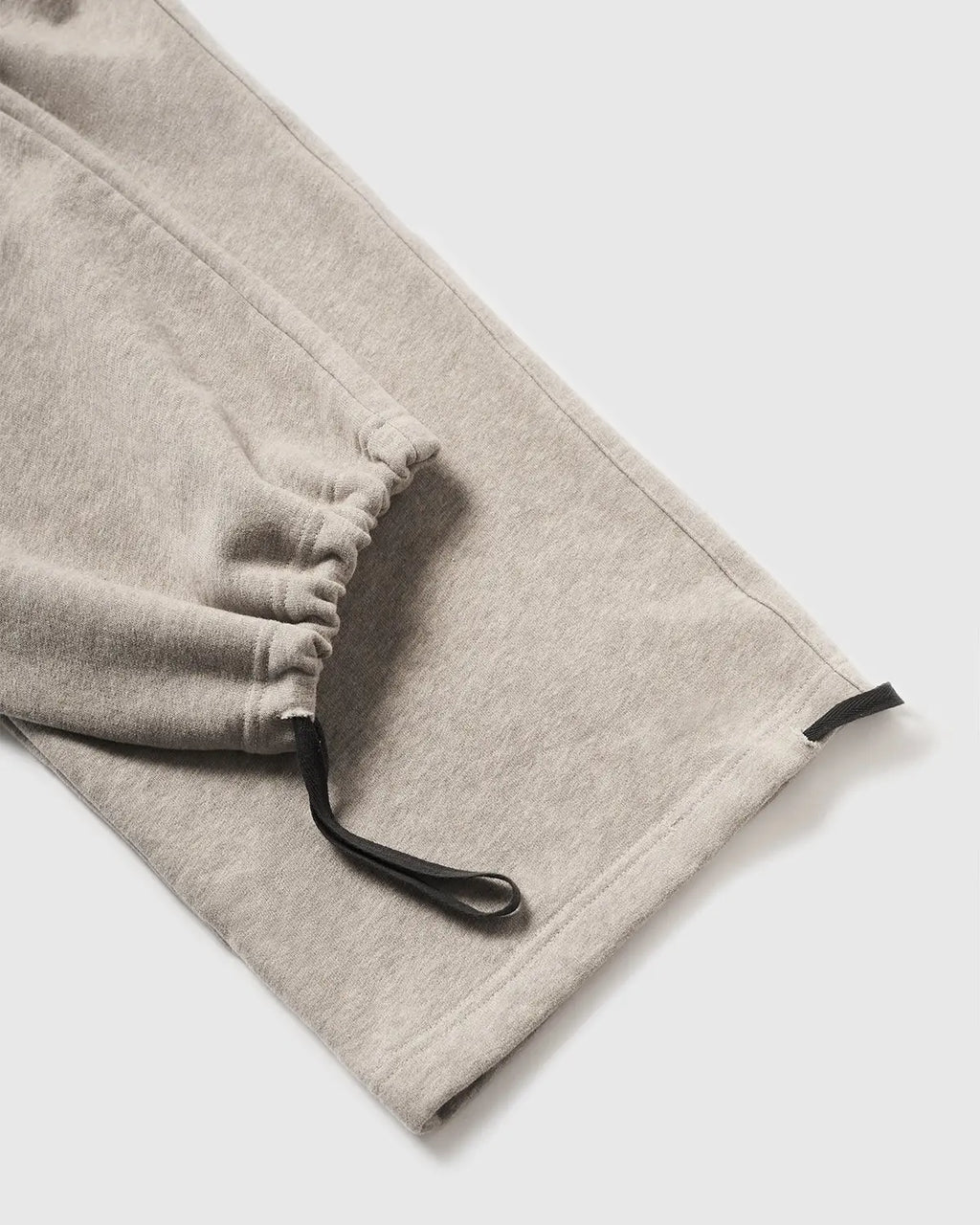 Inflation Premium Straight Leg Sweatpant in neutral color, featuring a relaxed fit and elastic waistband for comfort.