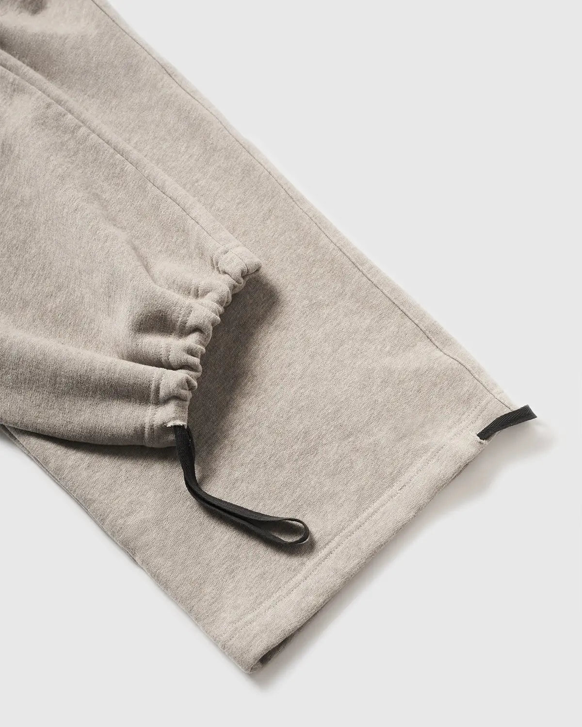 Inflation Premium Straight Leg Sweatpant in neutral color, featuring a relaxed fit and elastic waistband for comfort.