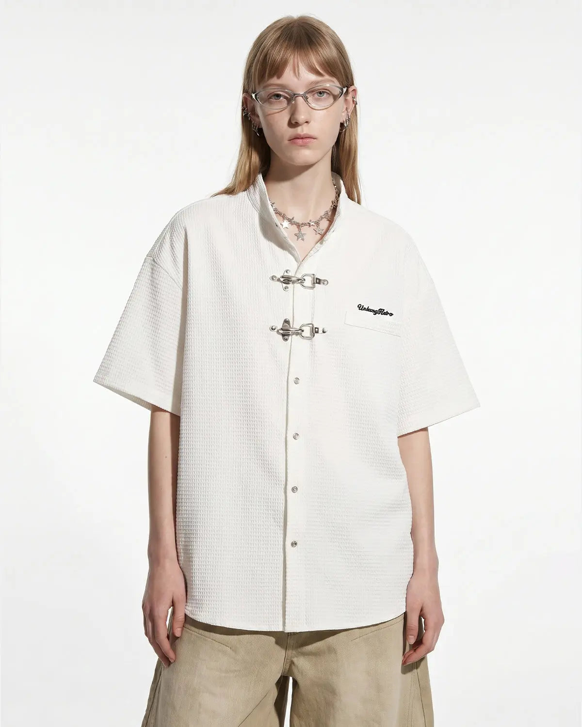 Inflation Streetwear waffle shirt featuring metal clasp detail and casual fit, displayed on a hanger.