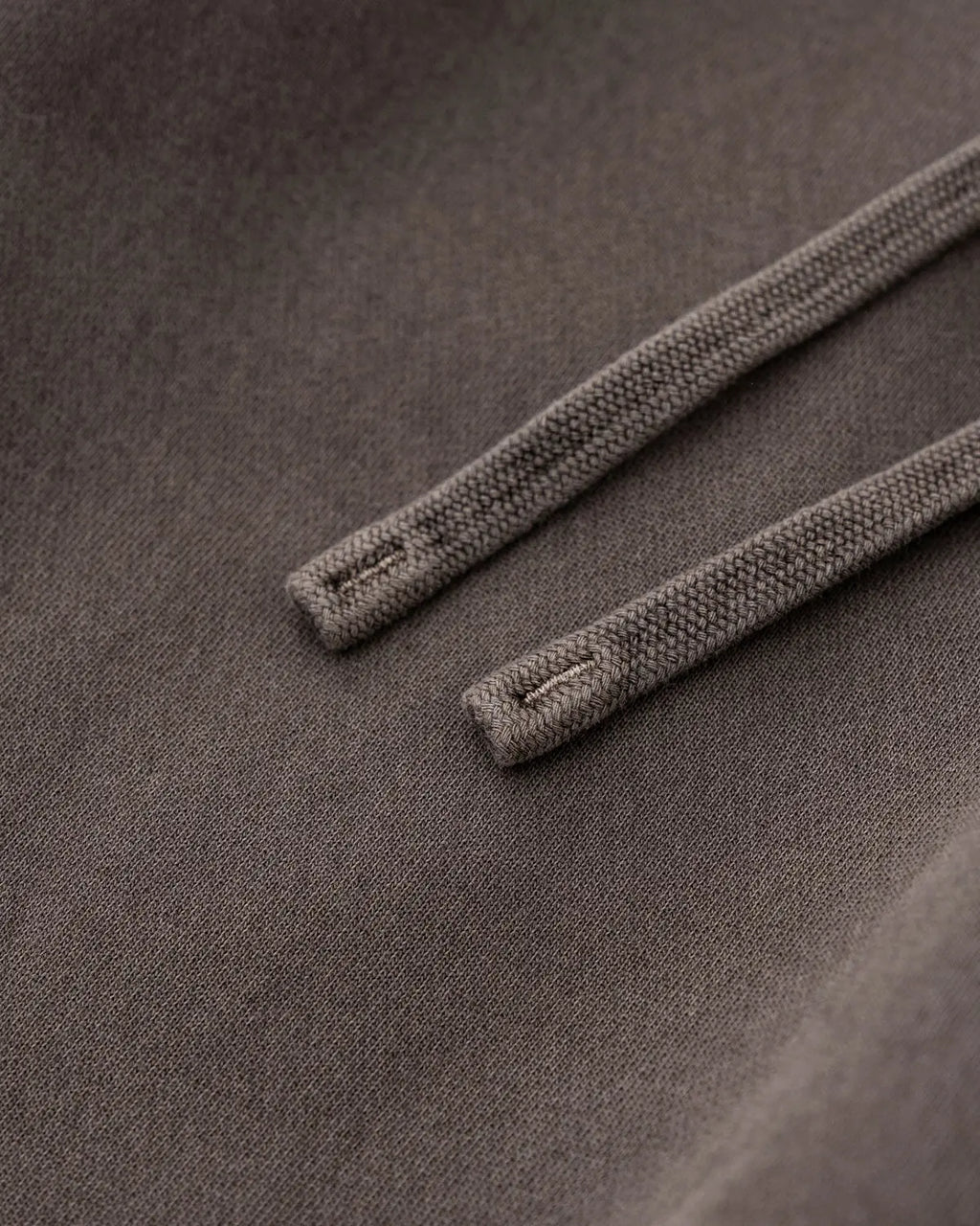 Flation streetwear patchwork straight leg sweatpants in neutral tones, showcasing their relaxed fit and stylish design.