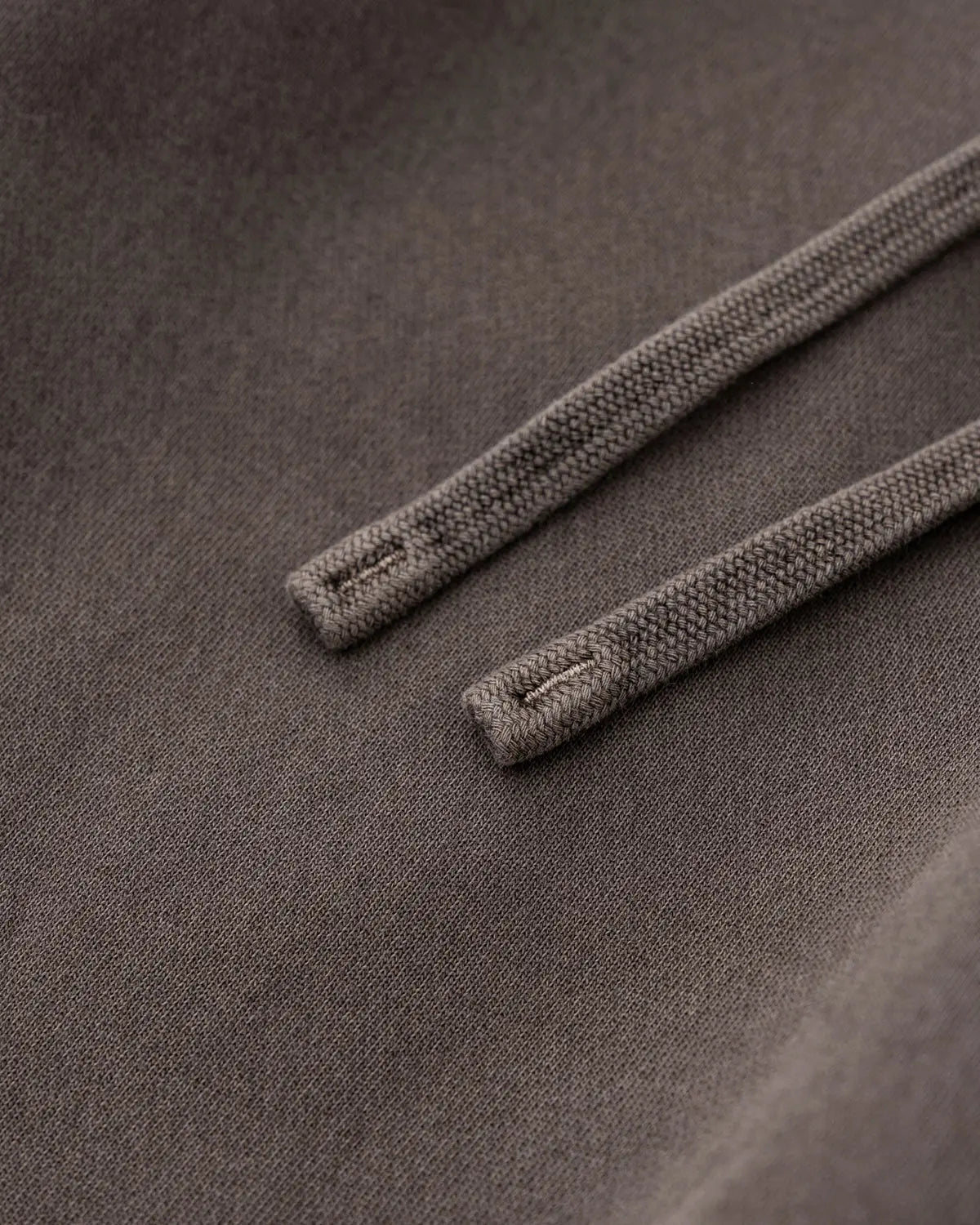 Flation streetwear patchwork straight leg sweatpants in neutral tones, showcasing their relaxed fit and stylish design.