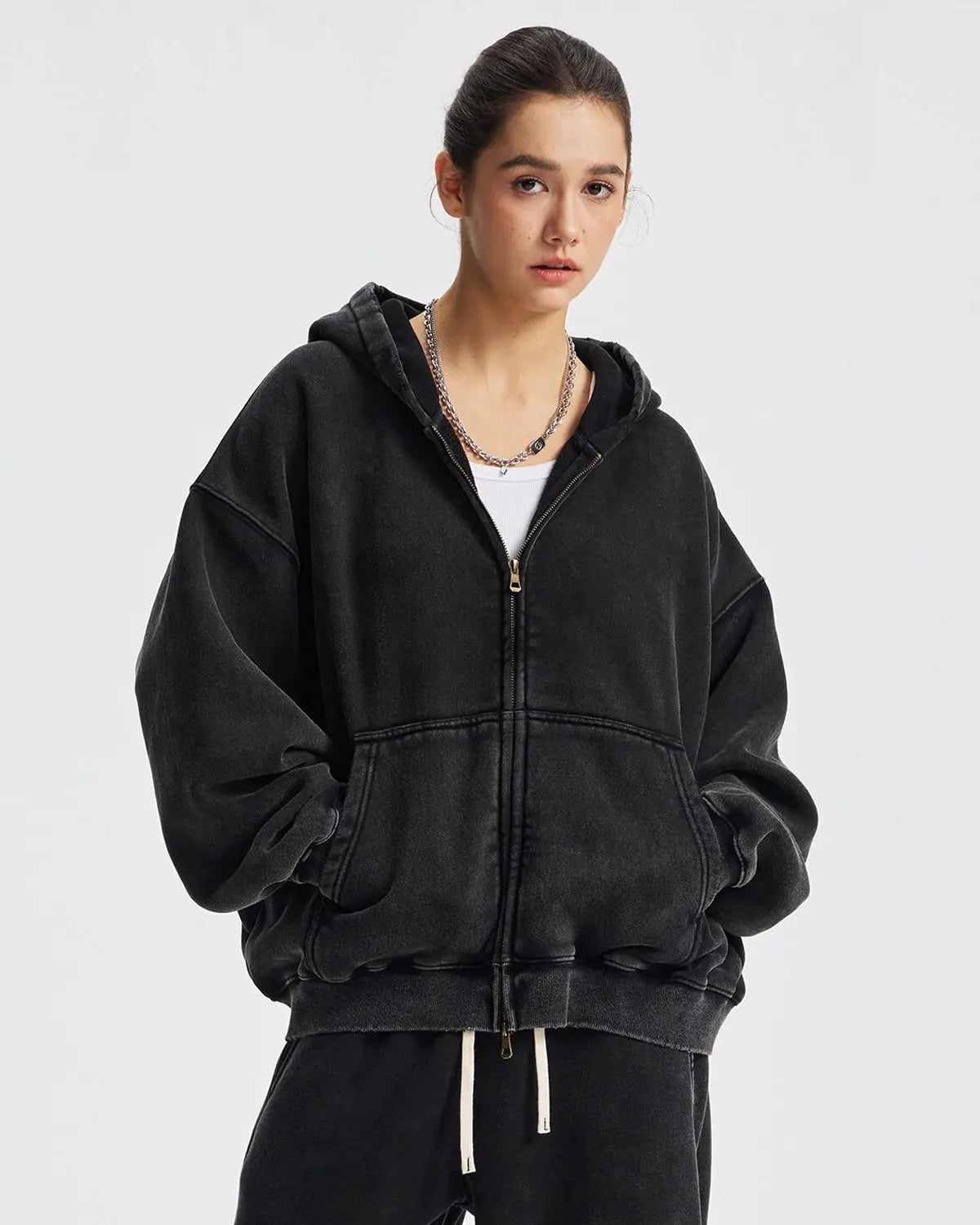 Boxy fit acid washed fleece zip-up hoodie by Flation Streetwear, featuring a casual, relaxed fit and distressed acid wash fabric.