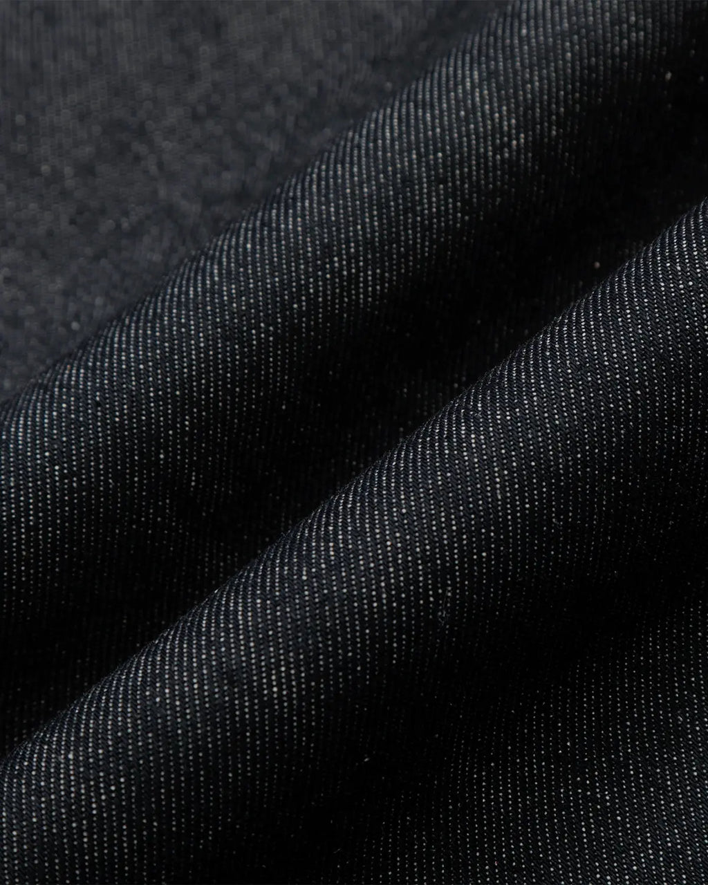 Raw baggy jeans with contrast stitching from Inflation Streetwear, featuring relaxed fit and distressed denim style.