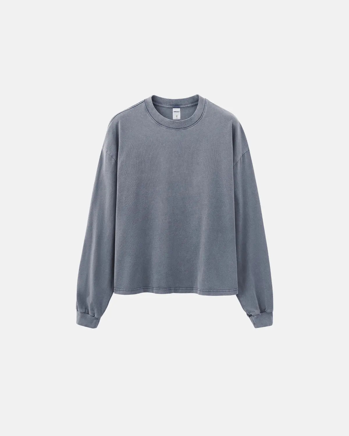 Distressed washed long sleeve tee by INFLATION, featuring a relaxed fit, faded fabric, and casual streetwear style.