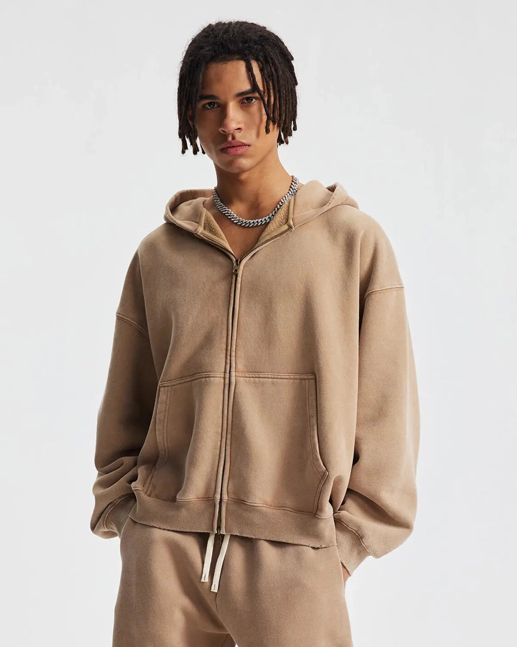 Boxy fit acid washed fleece zip-up hoodie by Flation Streetwear with a relaxed fit and front zipper, featuring a trendy acid wash finish.