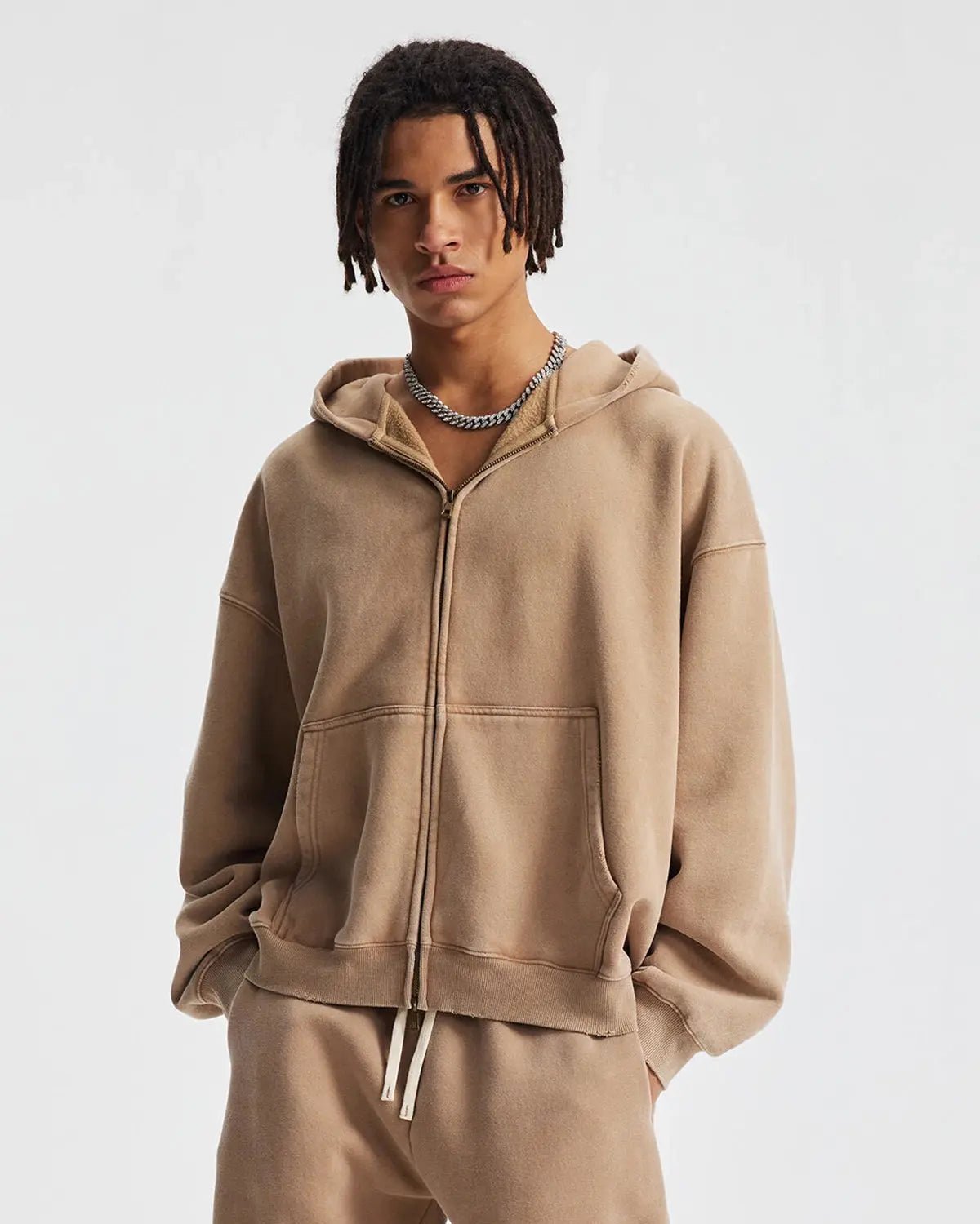 Boxy fit acid washed fleece zip-up hoodie by Flation Streetwear with a relaxed fit and front zipper, featuring a trendy acid wash finish.
