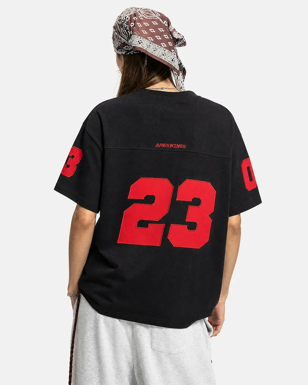 Inflation Streetwear varsity number applique t-shirt with bold number design on white cotton fabric.