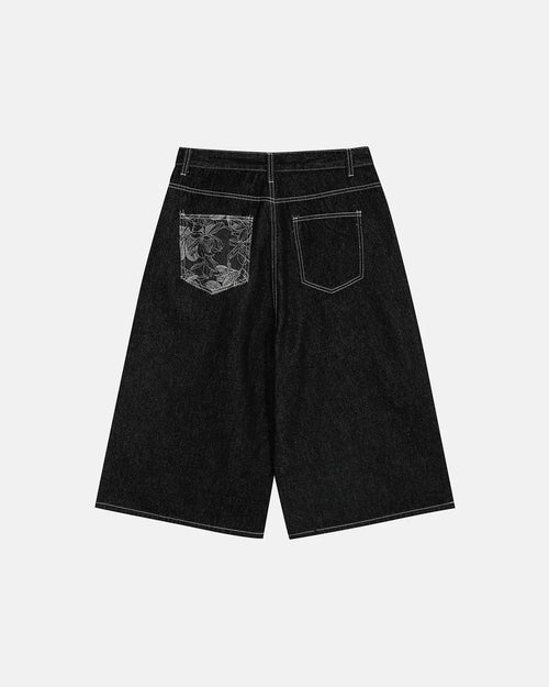 Flation Baggy Denim Jorts with embroidered pocket, casual streetwear pants featuring distressed denim and decorative stitching.