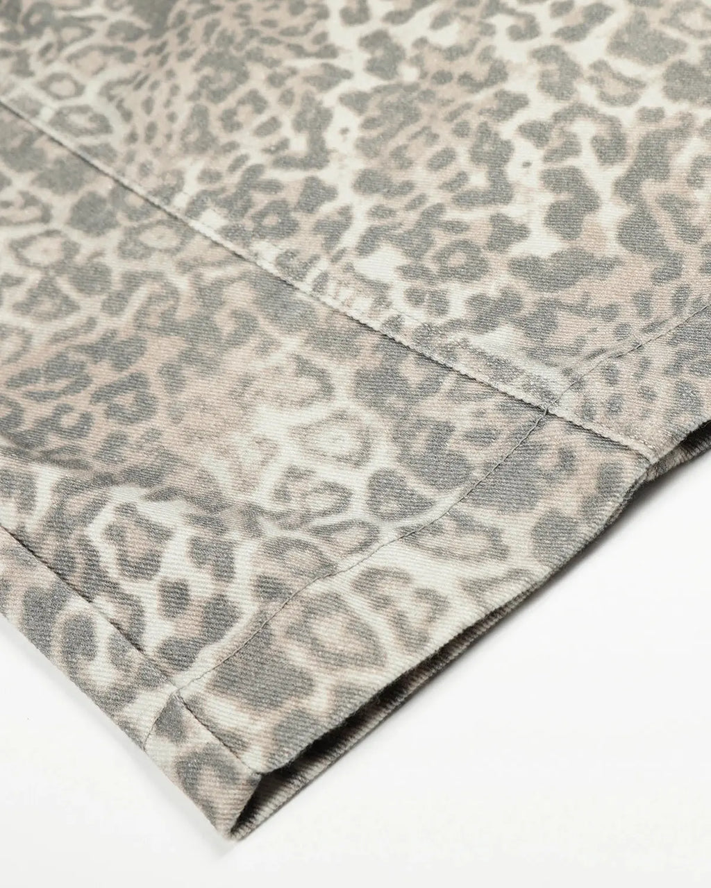 Leopard pattern cargo barrel pants by INFLATION featuring a relaxed streetwear style and multiple utility pockets.
