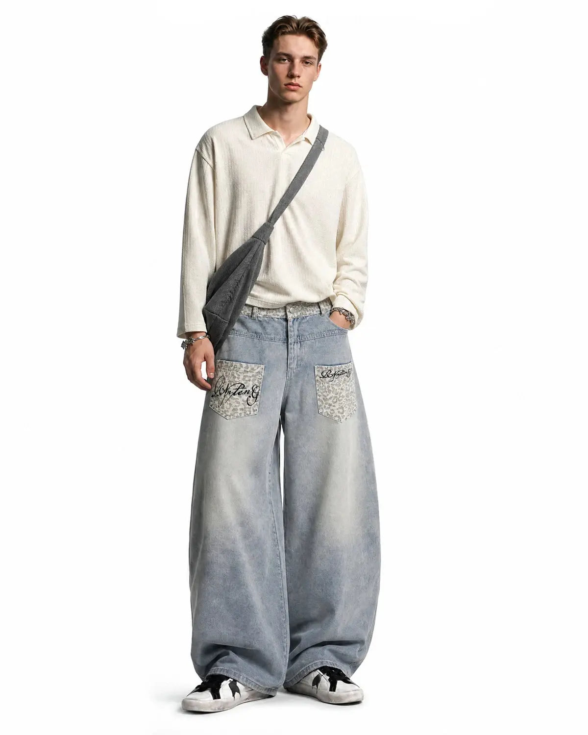 Leopard patch barrel jeans by INFLATION featuring stylish leopard print patches on classic denim barrel jeans.
