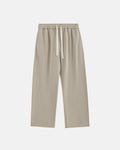 Inflation Heavyweight Straight-Leg Sweatpant in dark color, fitted style with waistband and pockets, casual streetwear look.