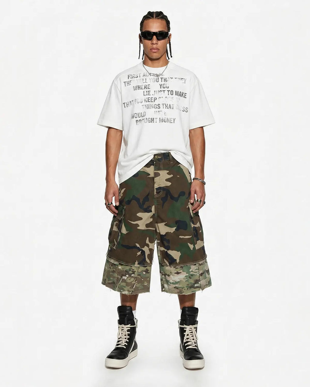 Camo layered longline jorts by INFLATION, stylish streetwear shorts with a layered design and camouflage pattern.