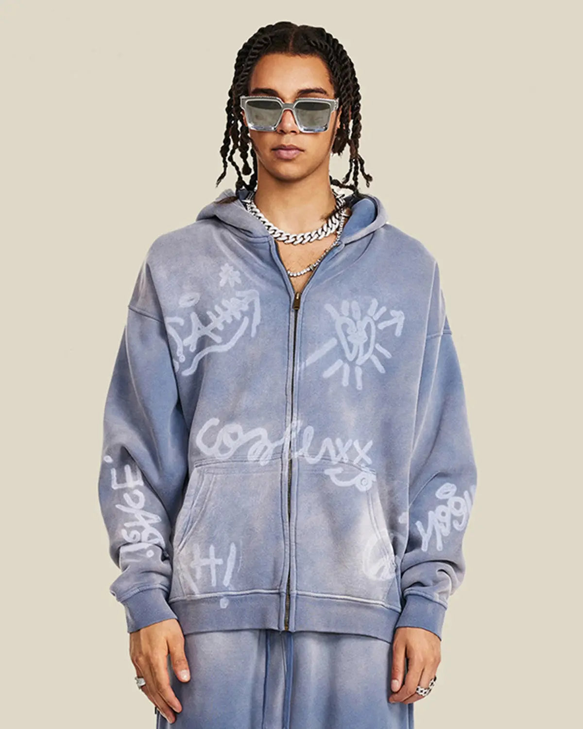 Flation graffiti washed zip-up hoodie featuring a colorful urban graffiti design on soft fabric.