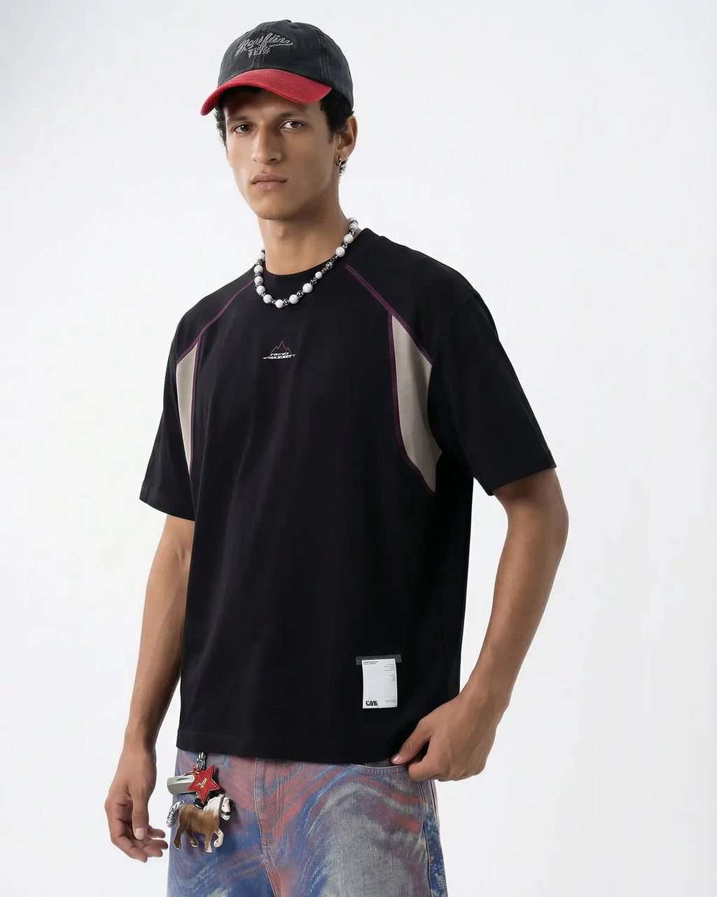 Inflation Streetwear glow-in-the-dark stitching oversized T-shirt with bold design, soft fabric, and relaxed fit in a casual style.