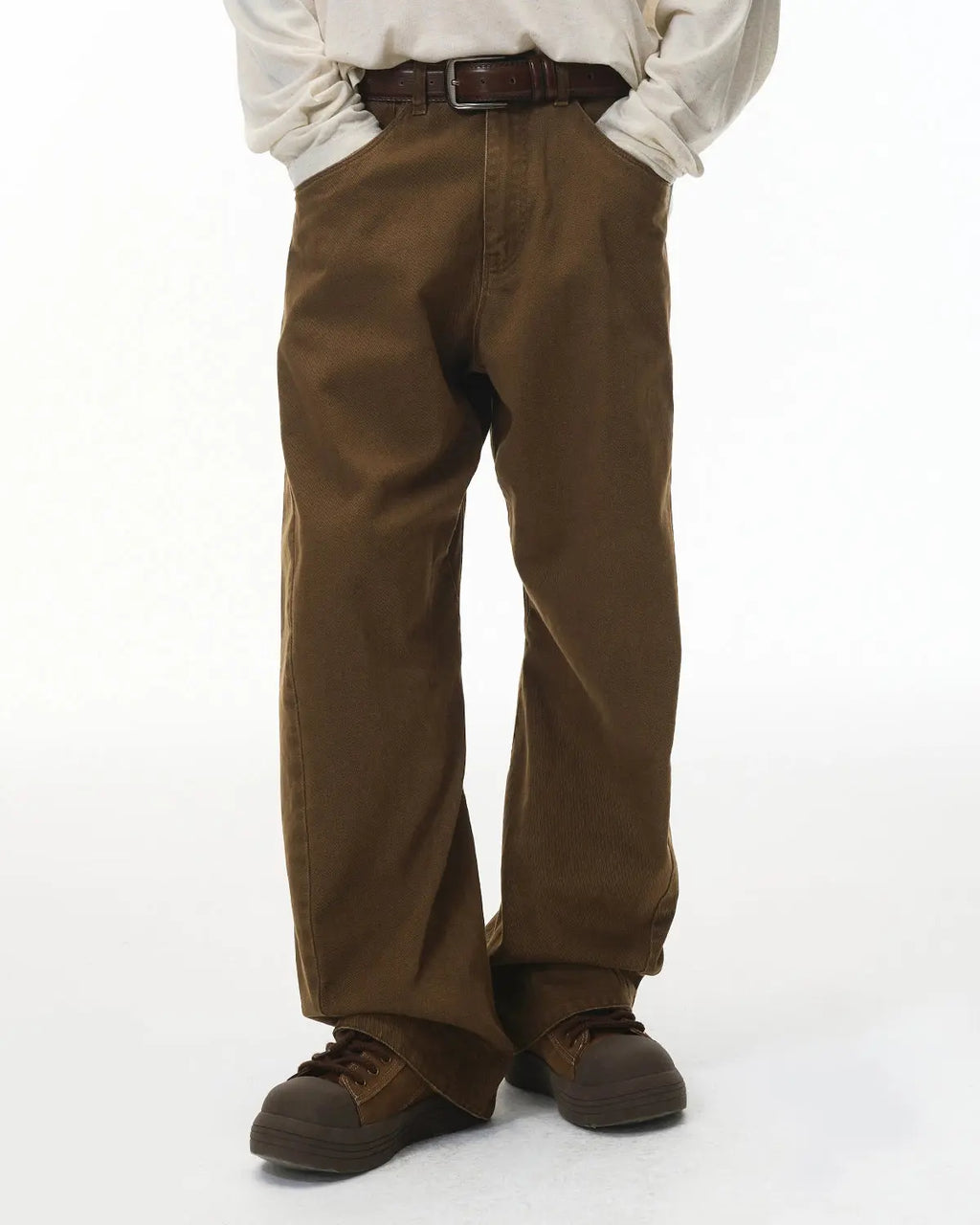 Flation Stitching Flare Baggy Jeans with ripped knees, high waist, and relaxed fit, streetwear style, shown on a model.