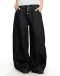 Black Buttons Up Barrel Baggy Jeans by INFLATION Streetwear featuring relaxed fit, button details, and classic barrel silhouette.