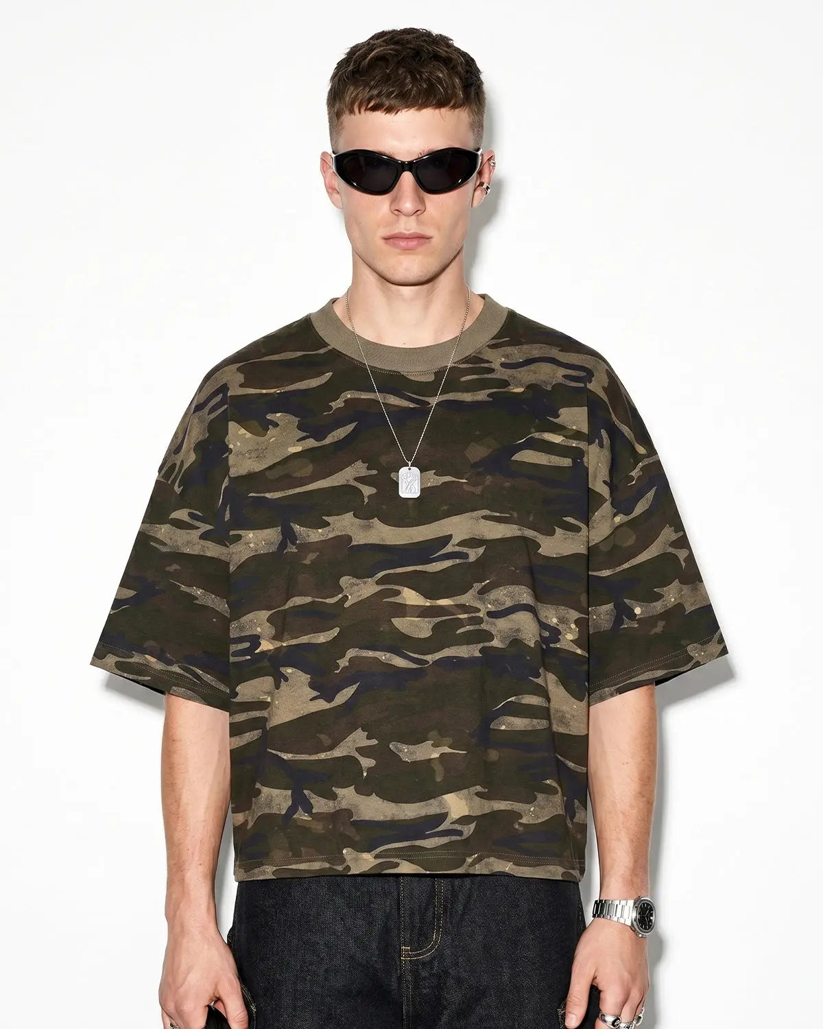 Boxy camo T-shirt by INFLATION featuring a loose fit and camouflage pattern, casual streetwear style.