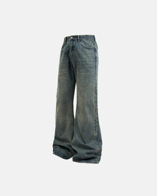 Acid wash beaded studded flared baggy jeans from INFLATION Streetwear with distressed details and wide-leg fit.