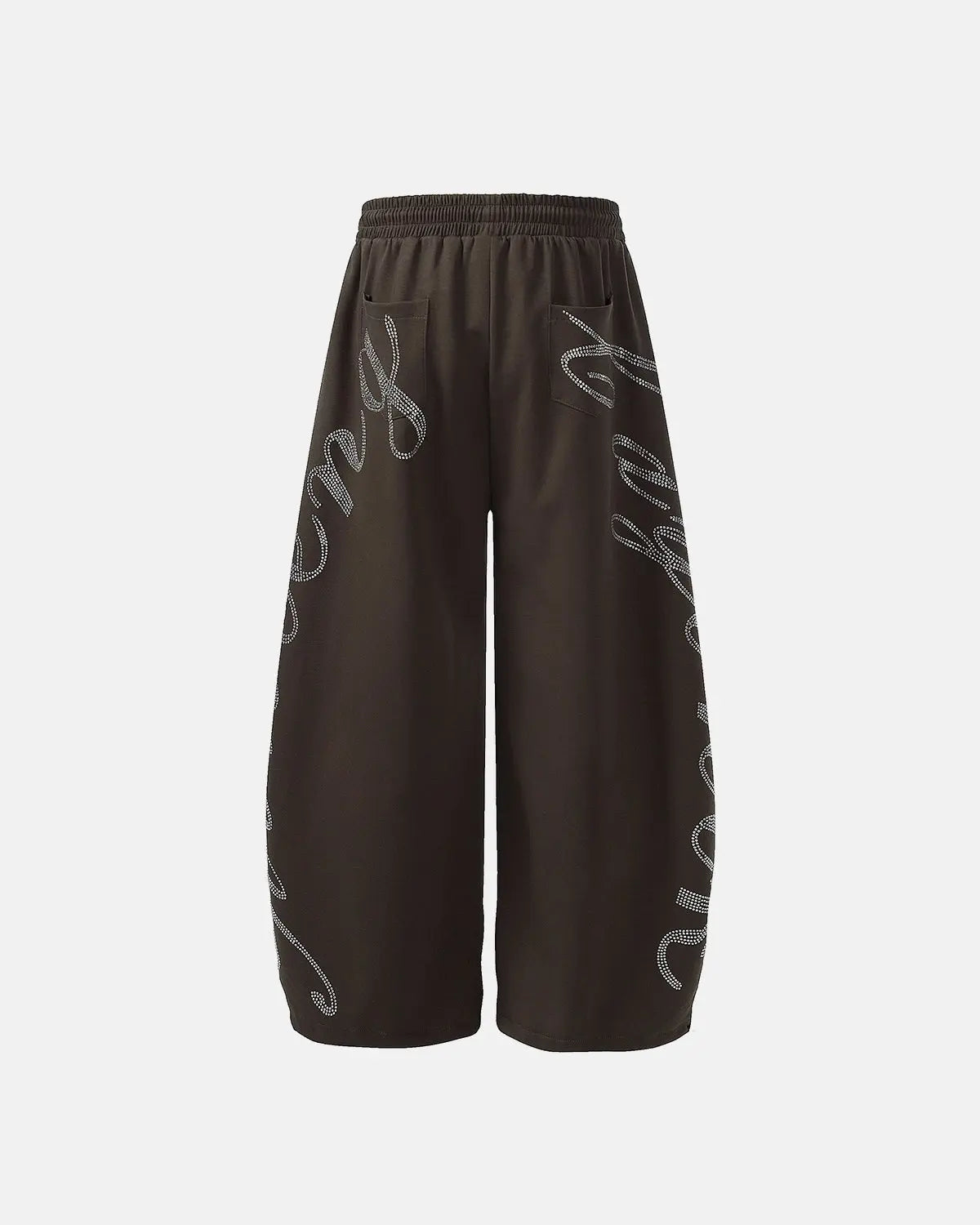 Shiny rhinestone baggy joggers from INFLATION streetwear collection showing a relaxed fit with sparkling rhinestone embellishments.