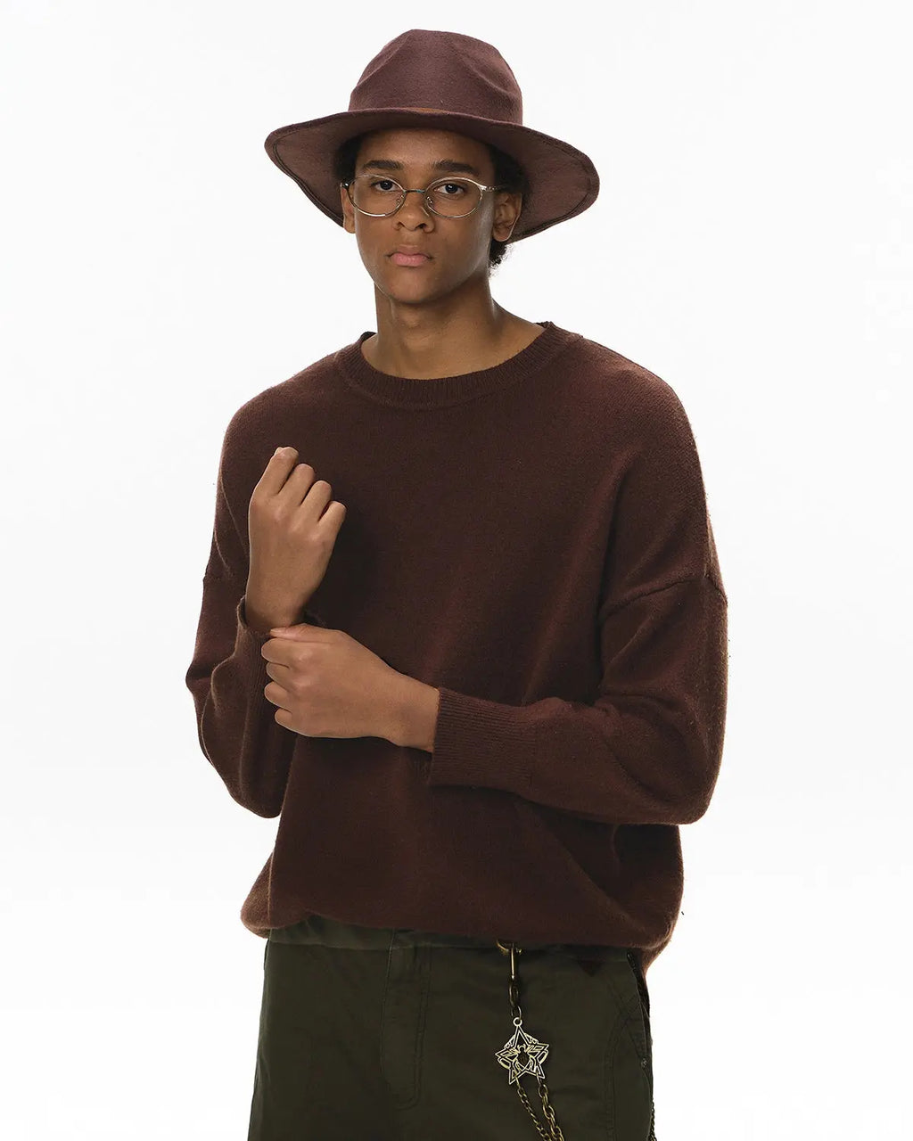 Inflation Streetwear crew neck knit sweater in soft fabric, showcasing a close-up of the textured knit pattern and ribbed collar.