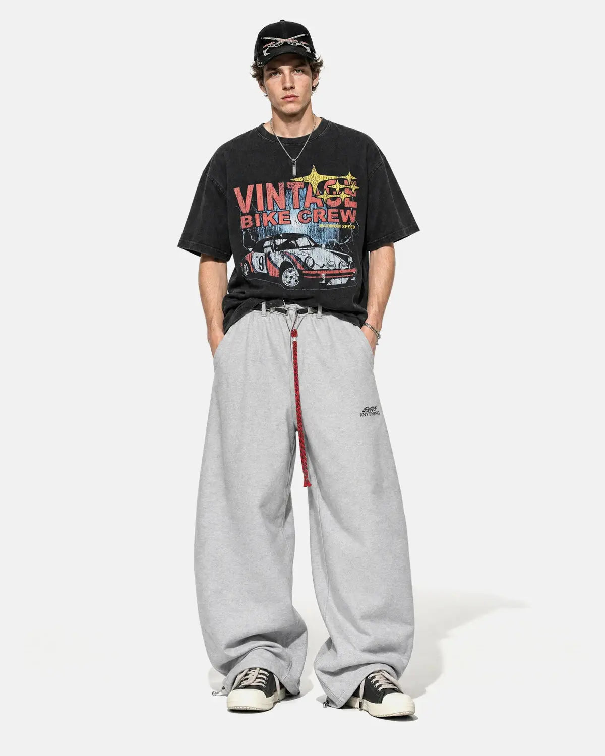 Vintage graphic snow washed T-shirt by INFLATION featuring retro streetwear style and distressed fabric texture.