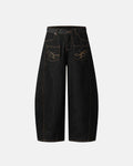 Inflation Streetwear Pocket Embroidery Raw Barrel Jeans showing distressed denim, front pockets, and raw hem detail