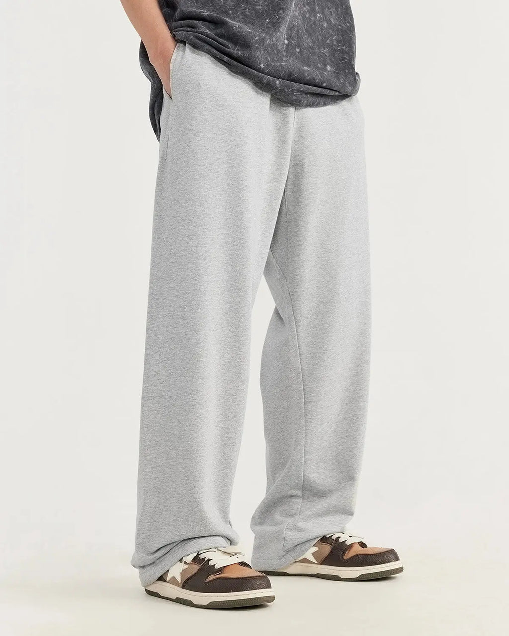 Heavyweight straight-leg sweatpants by INFLATION, showing the relaxed fit and soft fabric in a casual streetwear style.