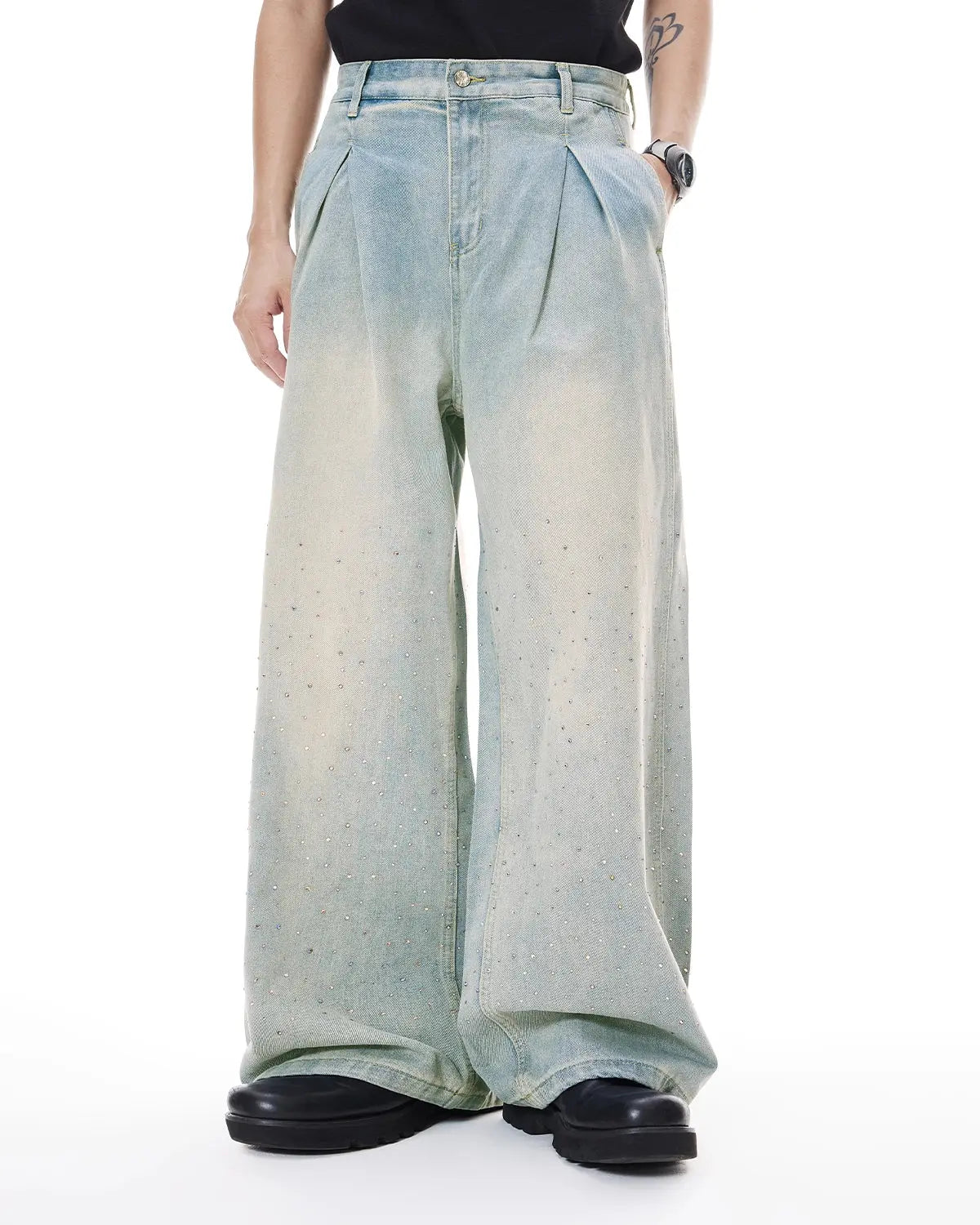 Washed rhinestone baggy jeans from Flation Streetwear, featuring distressed details and loose fit, styled as casual streetwear pants.