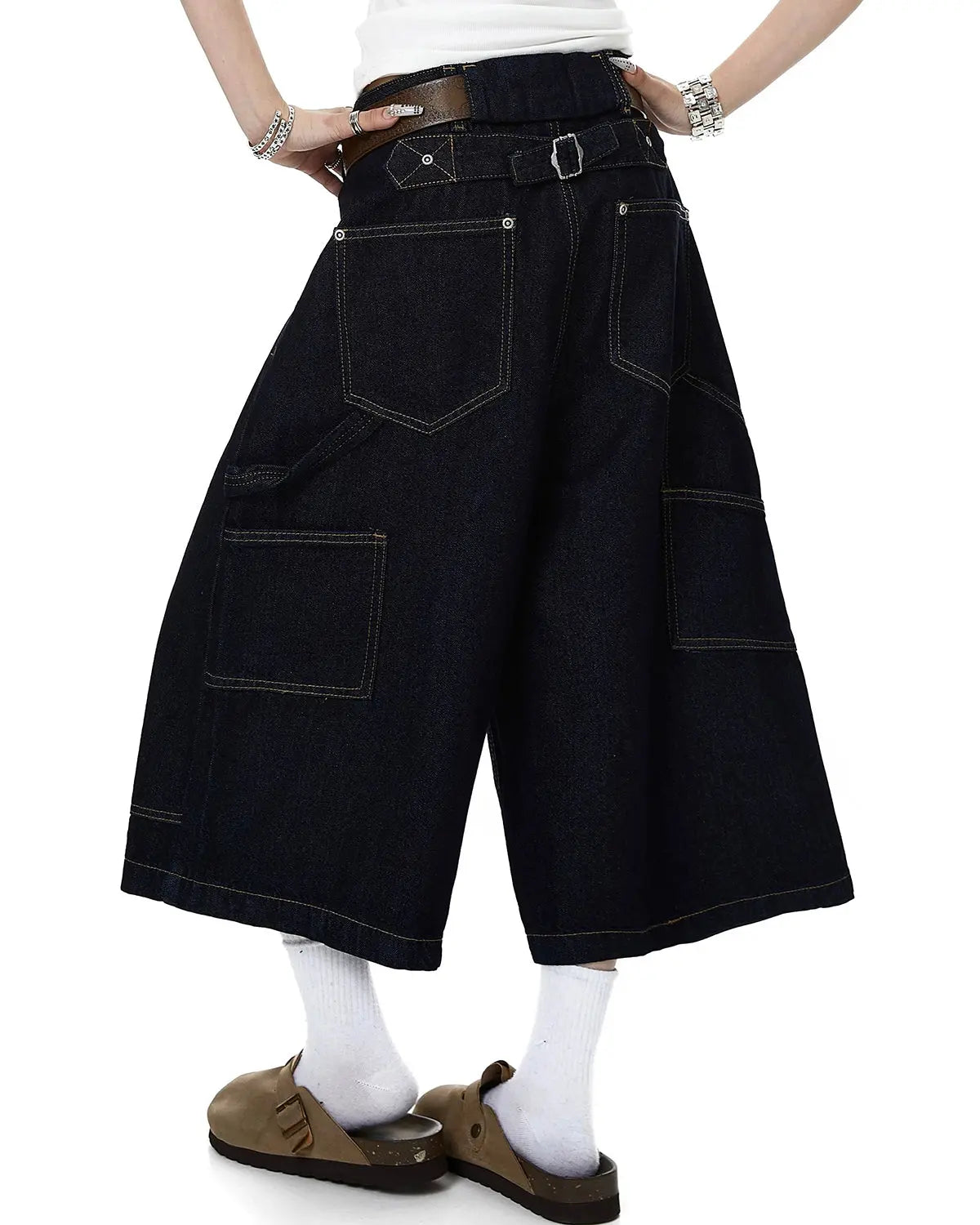 Cinch back buttons up cargo jorts by INFLATION featuring distressed denim, cargo pockets, and a relaxed streetwear style.