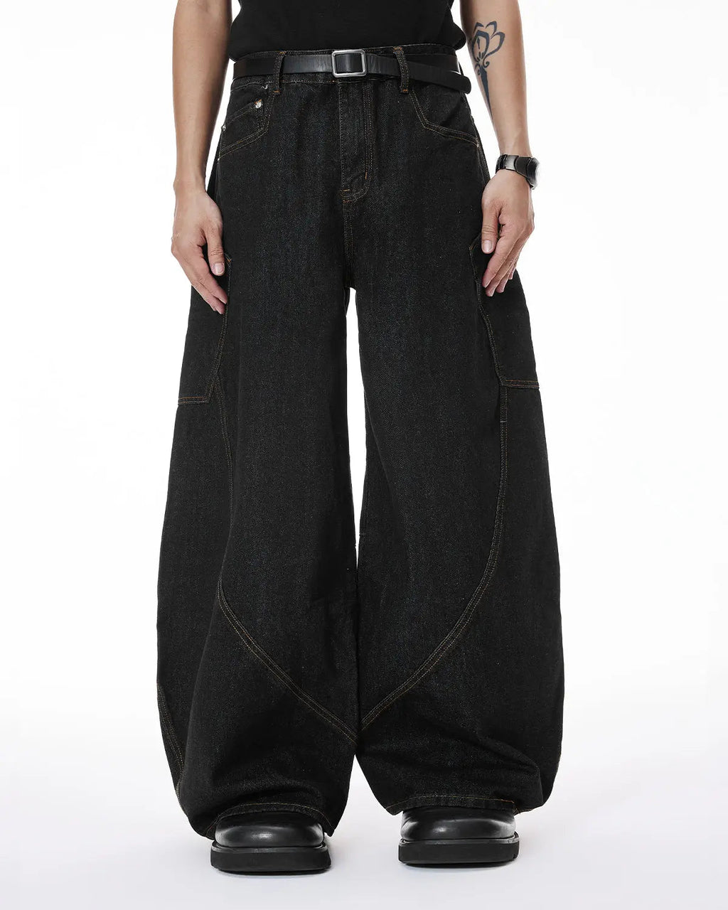 Colorful rhinestone raw barrel jeans by Flation featuring vibrant embellishments and distressed denim style.