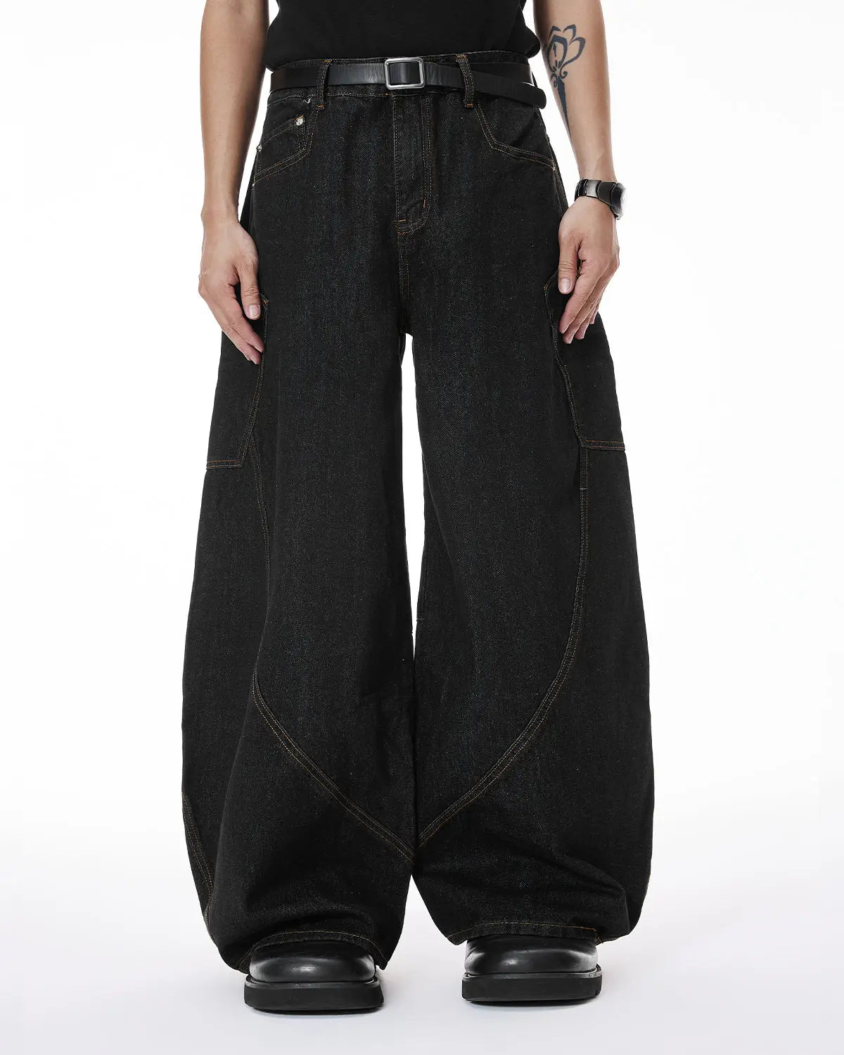 Colorful rhinestone raw barrel jeans by Flation featuring vibrant embellishments and distressed denim style.