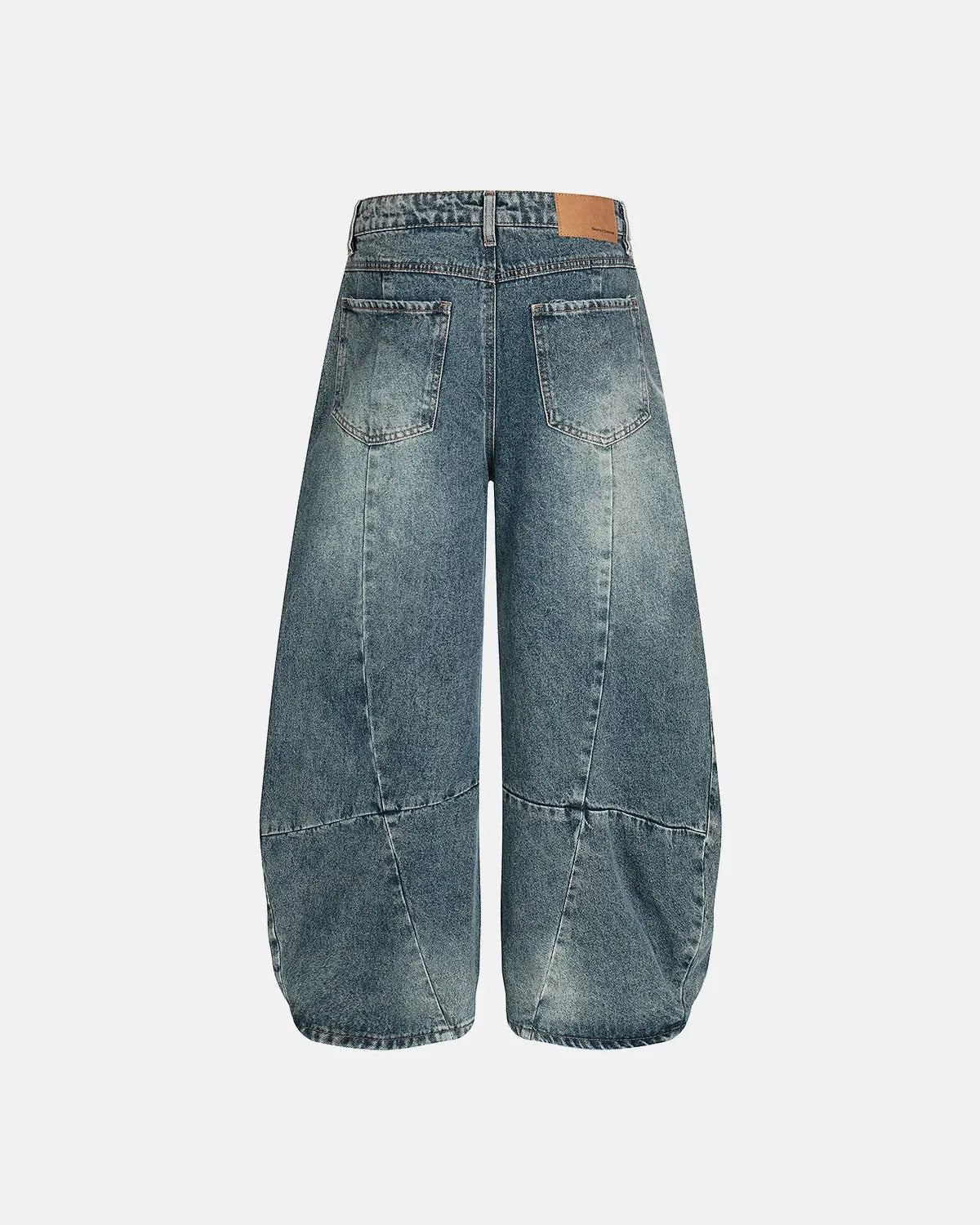 Inflation Whisker Acid Washed Barrel Jeans showing distressed denim and relaxed fit with whisker detailing on the thighs.