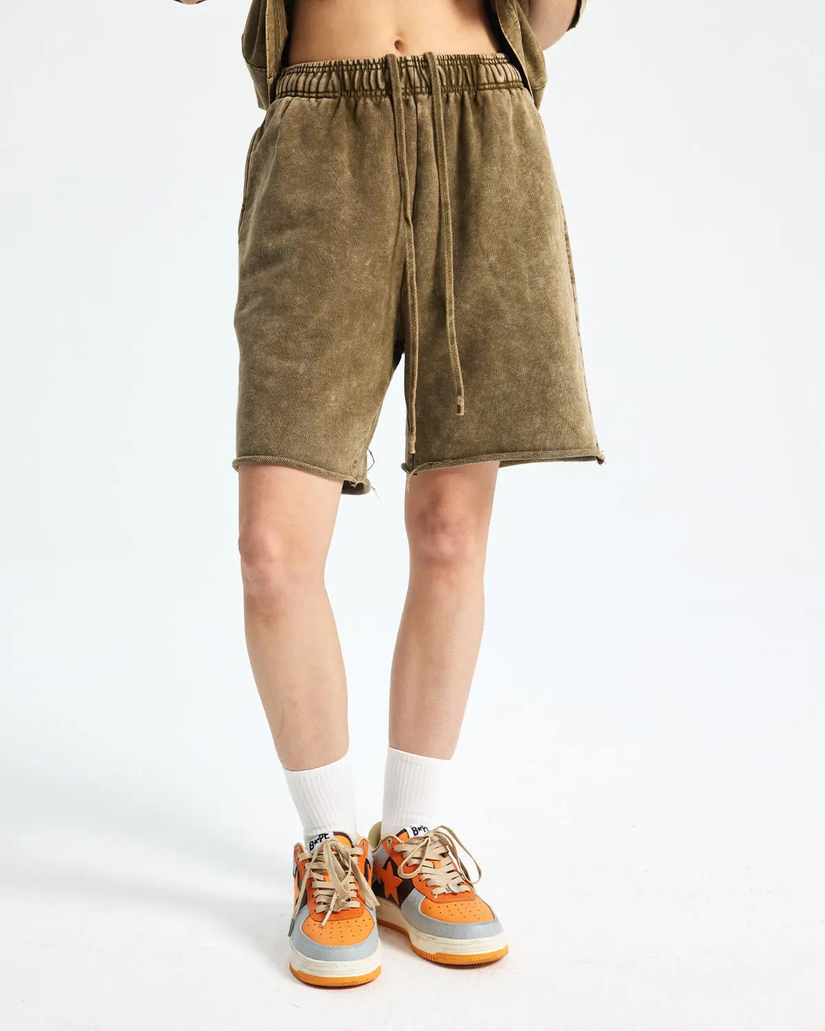 Inflation brand heavyweight washed sweat shorts, casual streetwear pants with a relaxed fit and distressed fabric detail.