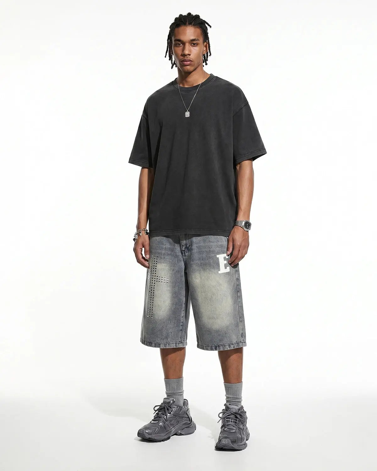 Oversized heavyweight washed T-shirt by Flation Streetwear, showing soft, faded fabric and relaxed fit in natural light.