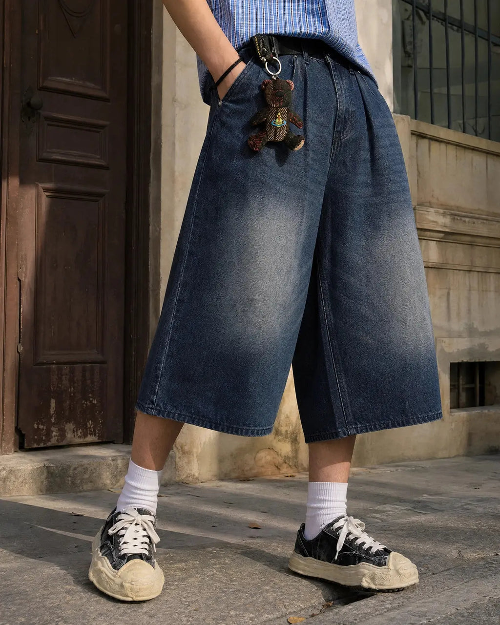Inflation Double Waist Baggy Jorts in denim, featuring a relaxed fit and stylish streetwear design, shown in a close-up image.