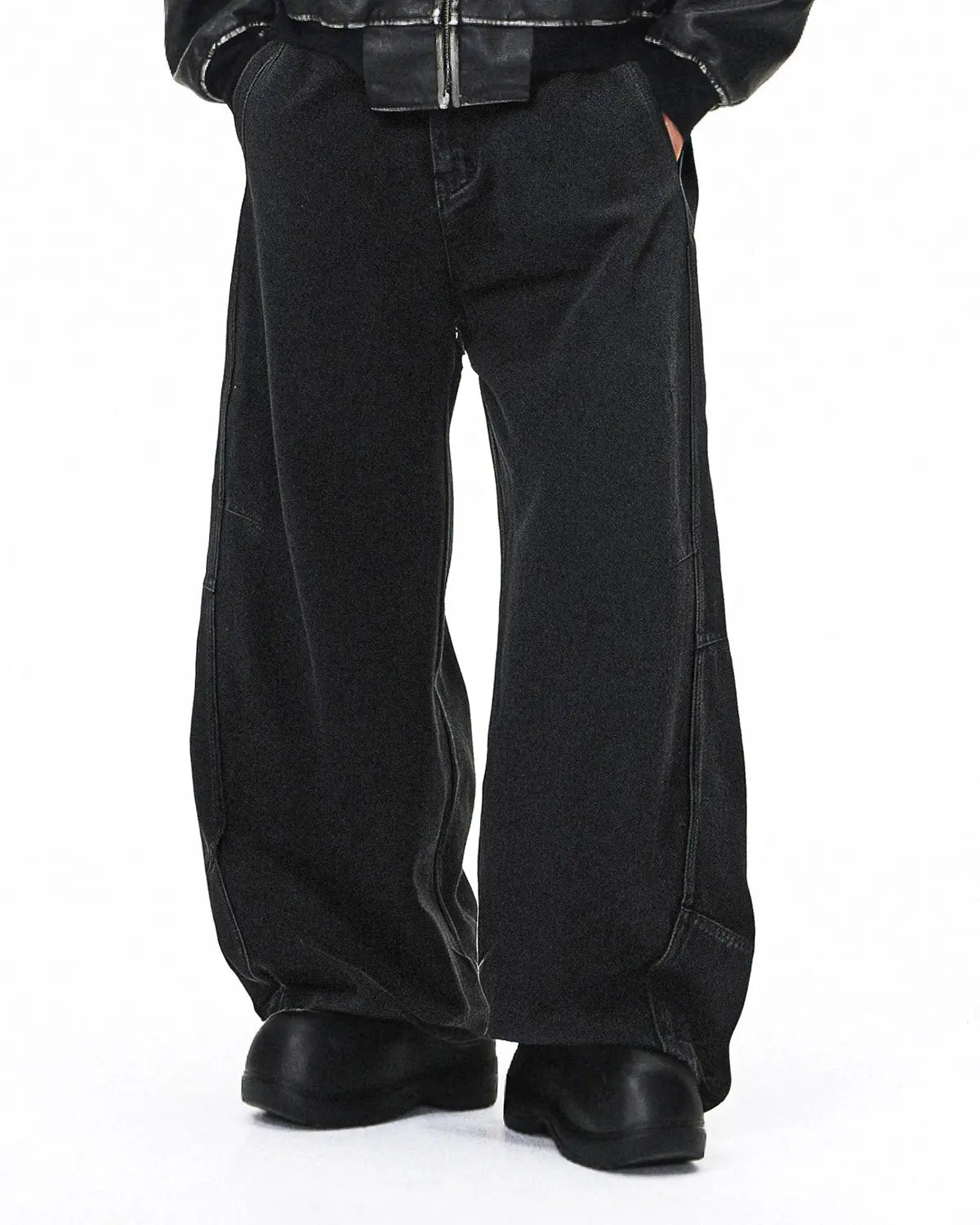 Acid washed black barrel jeans by INFLATION featuring a relaxed fit, distressed detailing, and classic five-pocket design.