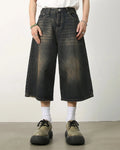 Baggy Jumbo Jorts by Flation, oversized denim jorts with a relaxed fit and distressed details, styled for streetwear fashion.
