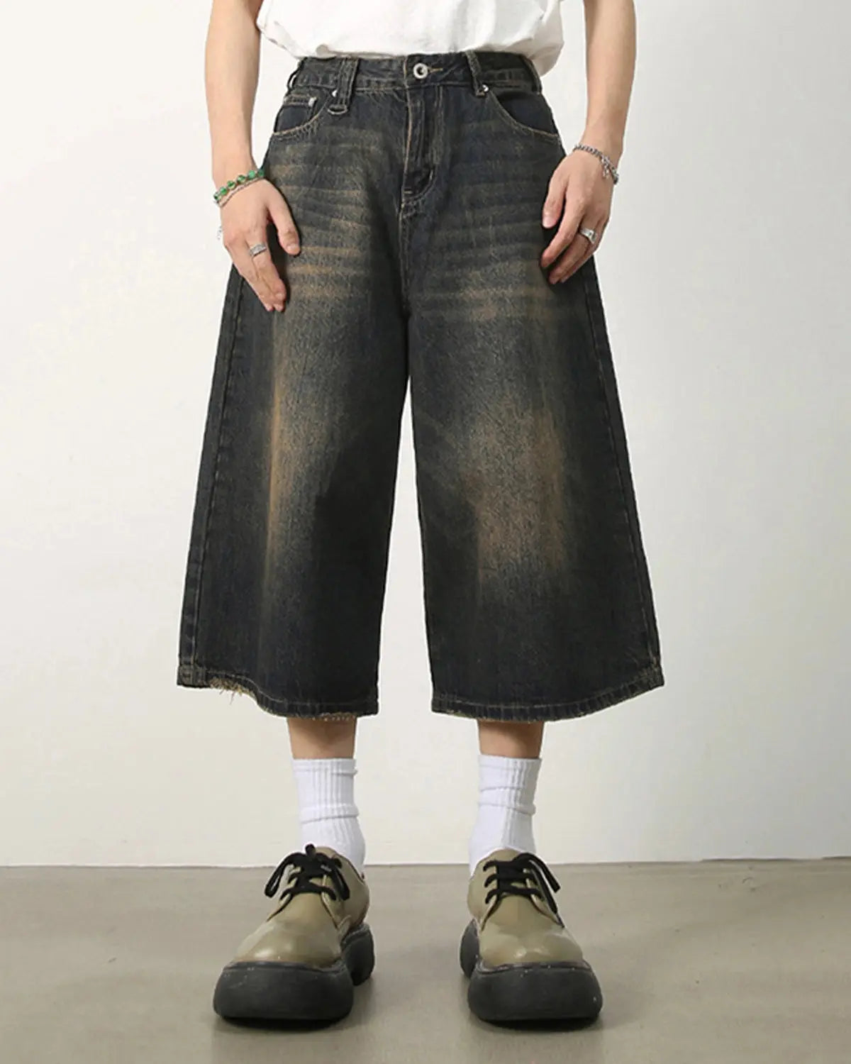 Baggy Jumbo Jorts by Flation, oversized denim jorts with a relaxed fit and distressed details, styled for streetwear fashion.