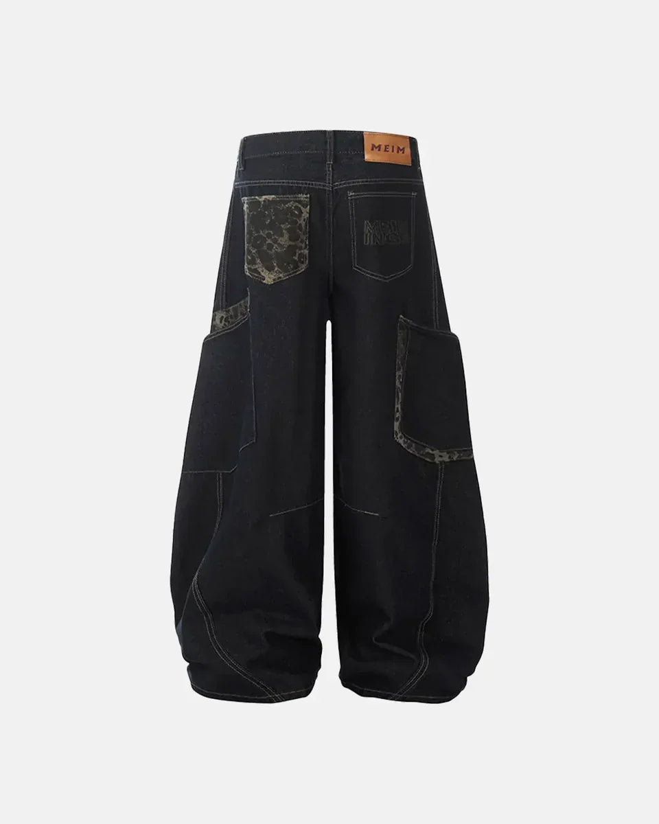 Leopard patchwork barrel jeans by Flation Streetwear featuring bold leopard print and relaxed fit denim style.
