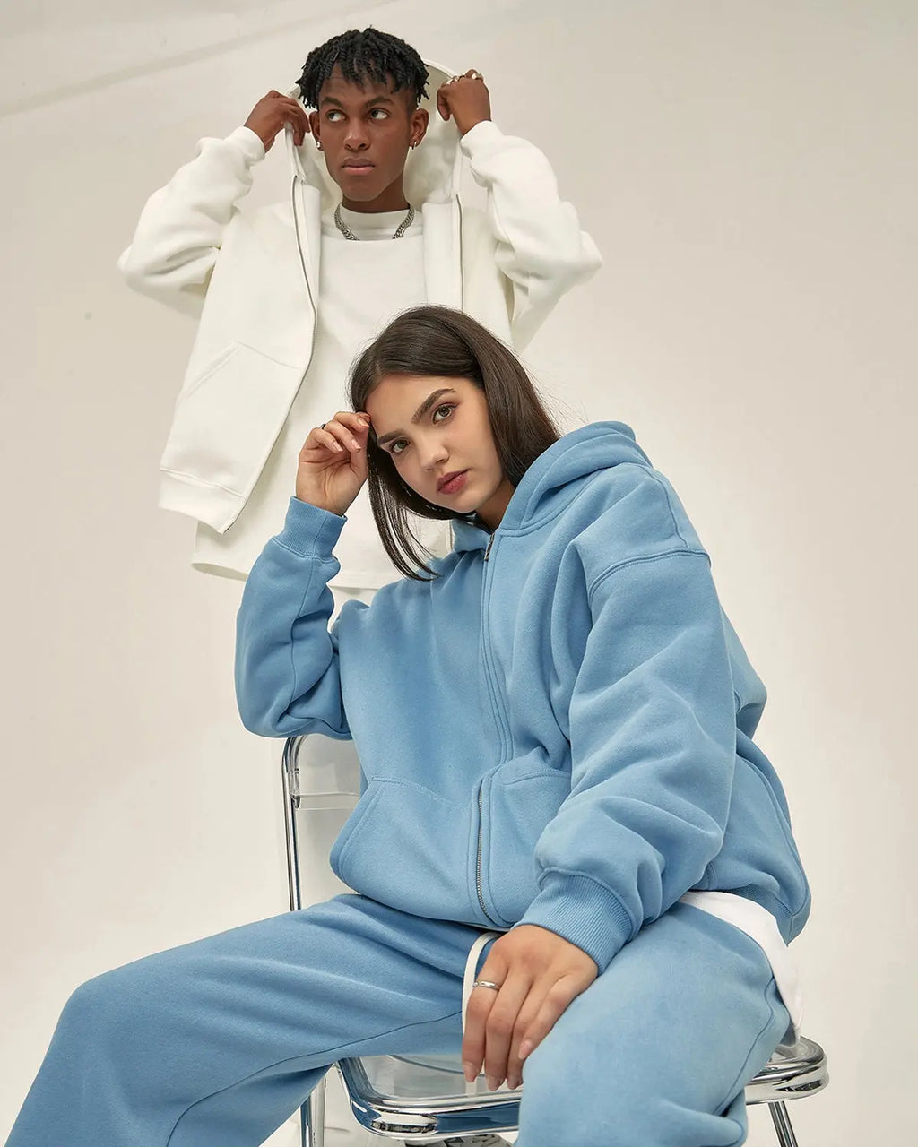 Flation fleece double zip-up hoodie jacket with hood, soft fabric, and front zippers, casual streetwear style.