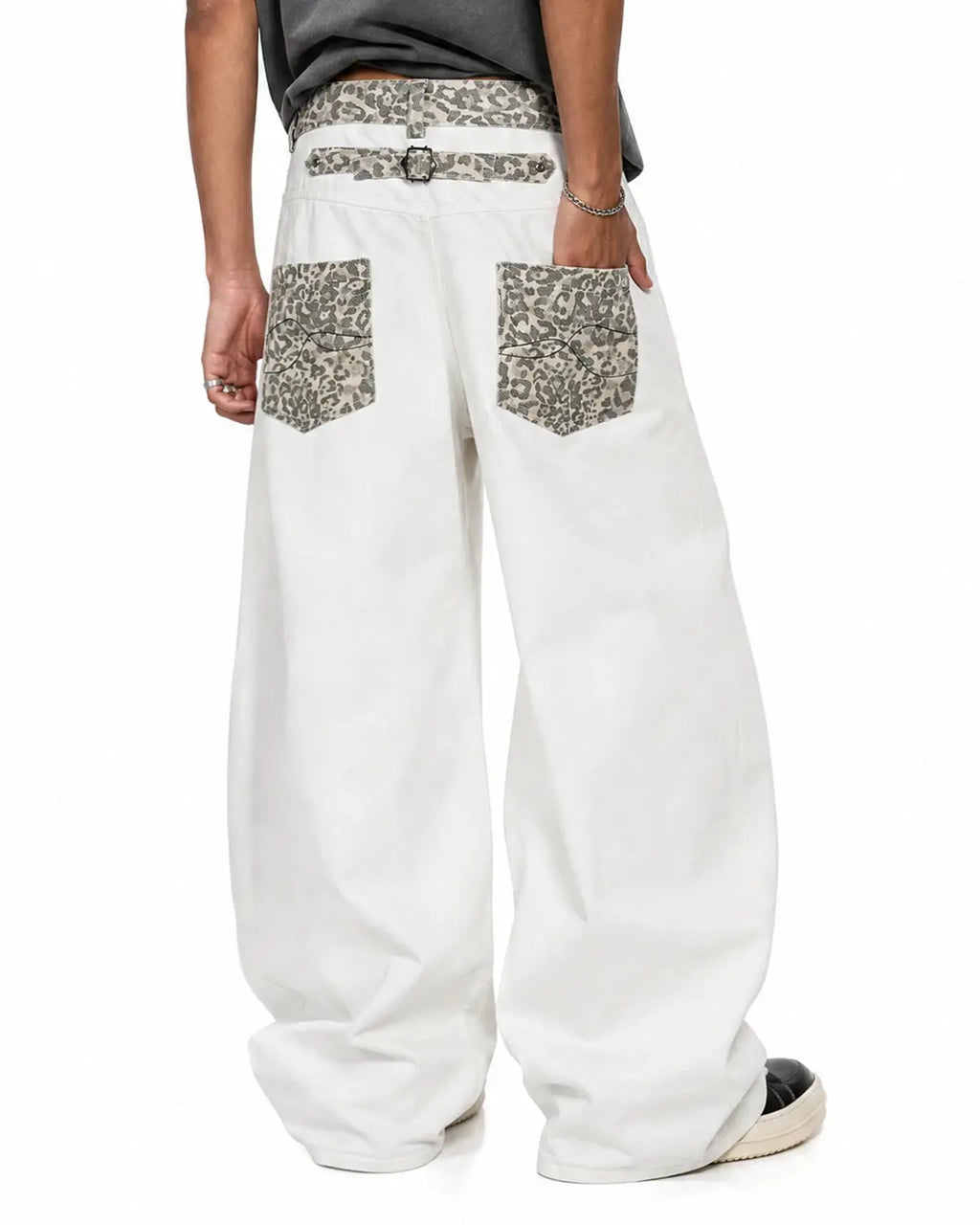 Leopard patch barrel jeans by INFLATION featuring bold leopard print patches and relaxed fit denim for streetwear style.