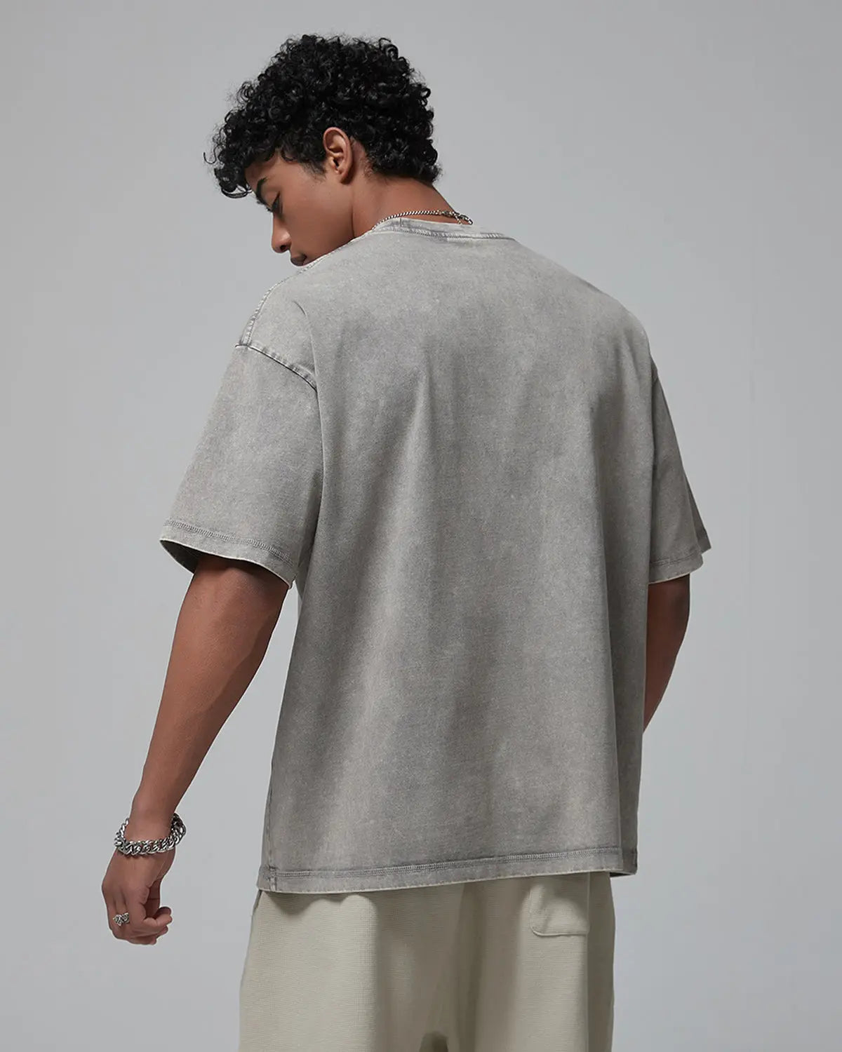 Wax washed mock neck T-shirt by INFLATION, streetwear style, shown in close-up highlighting fabric texture and fit.