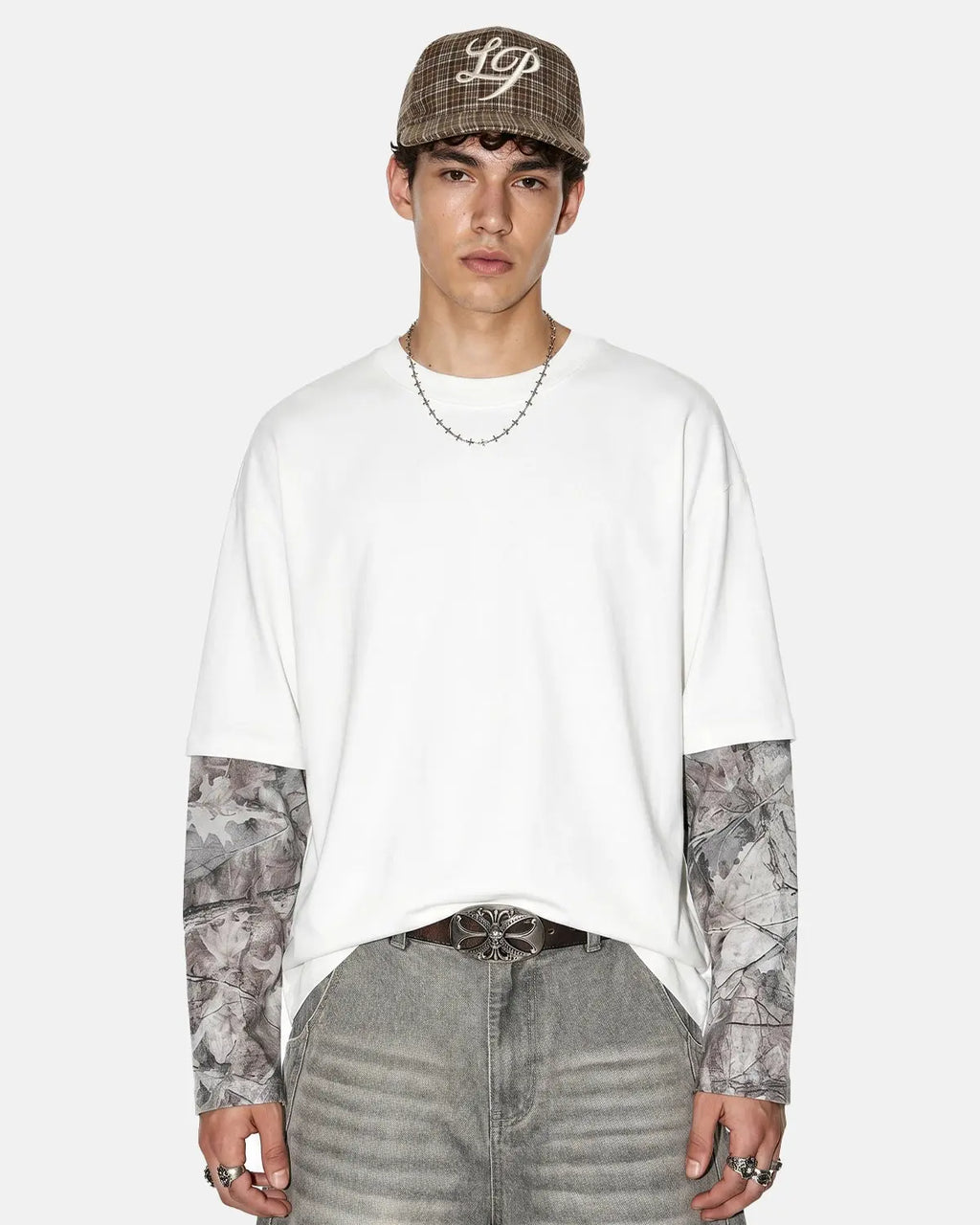 Oversized camo layered T-shirt by Flation streetwear featuring a bold camouflage pattern and relaxed fit.