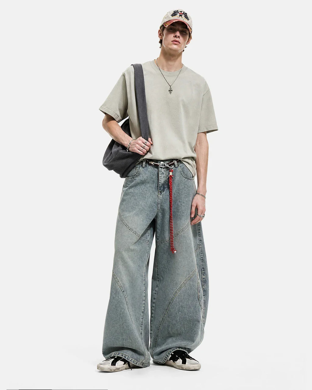 Flation acid wash baggy jeans with stitching, relaxed fit, and distressed style, perfect for streetwear fashion.