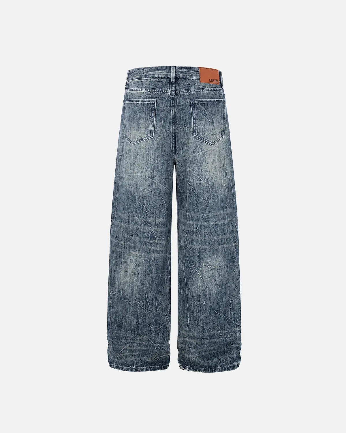 Textured wash baggy jeans by Inflation Streetwear featuring a relaxed fit and distressed denim look.
