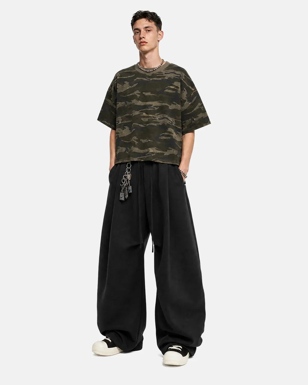 Light beige cotton linen wide-leg pants by INFLATION, featuring a relaxed fit and flowing silhouette for casual streetwear style.