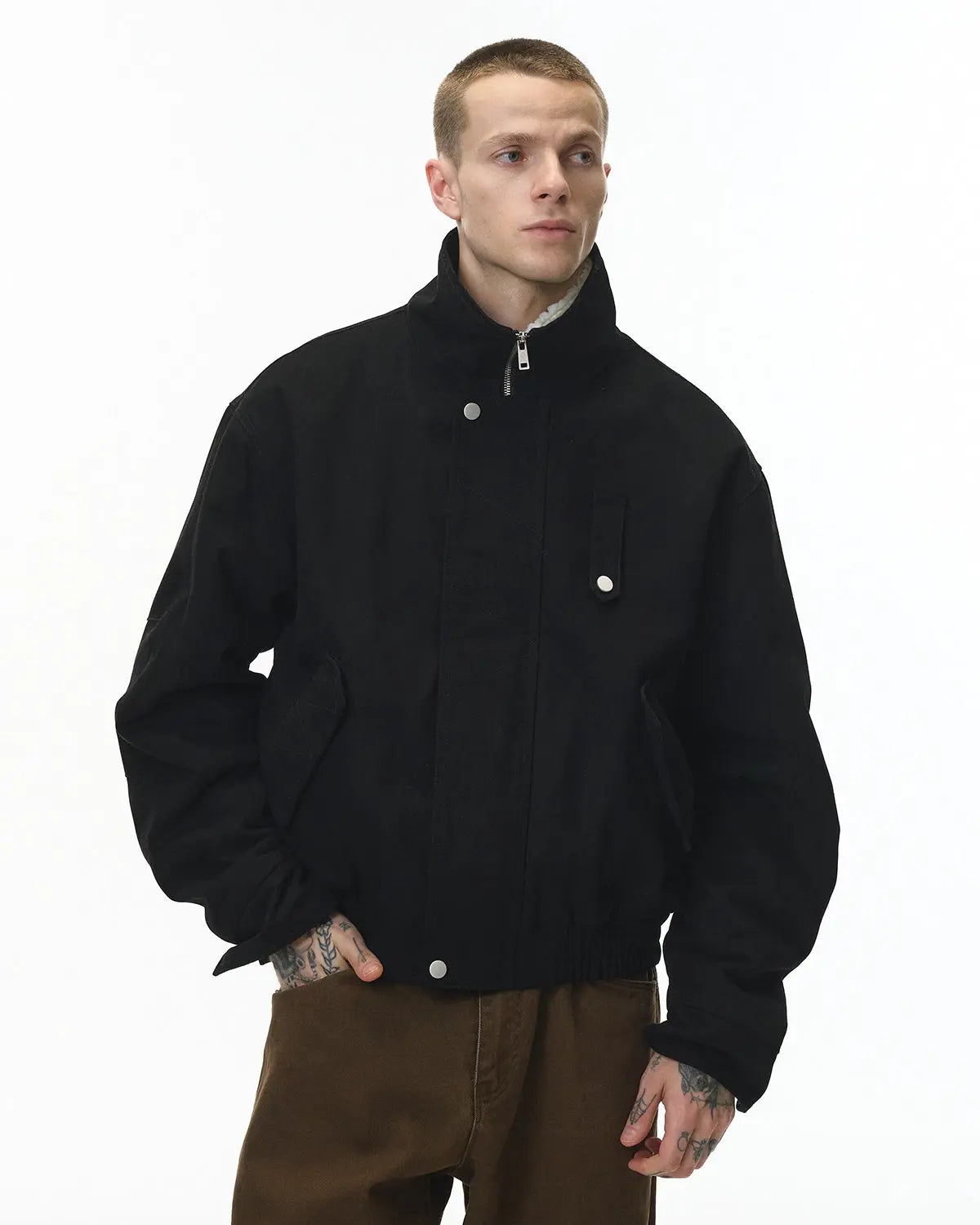 Inflation streetwear faux shearling lambswool jacket with plush lining and stylish design, suitable for casual winter wear.