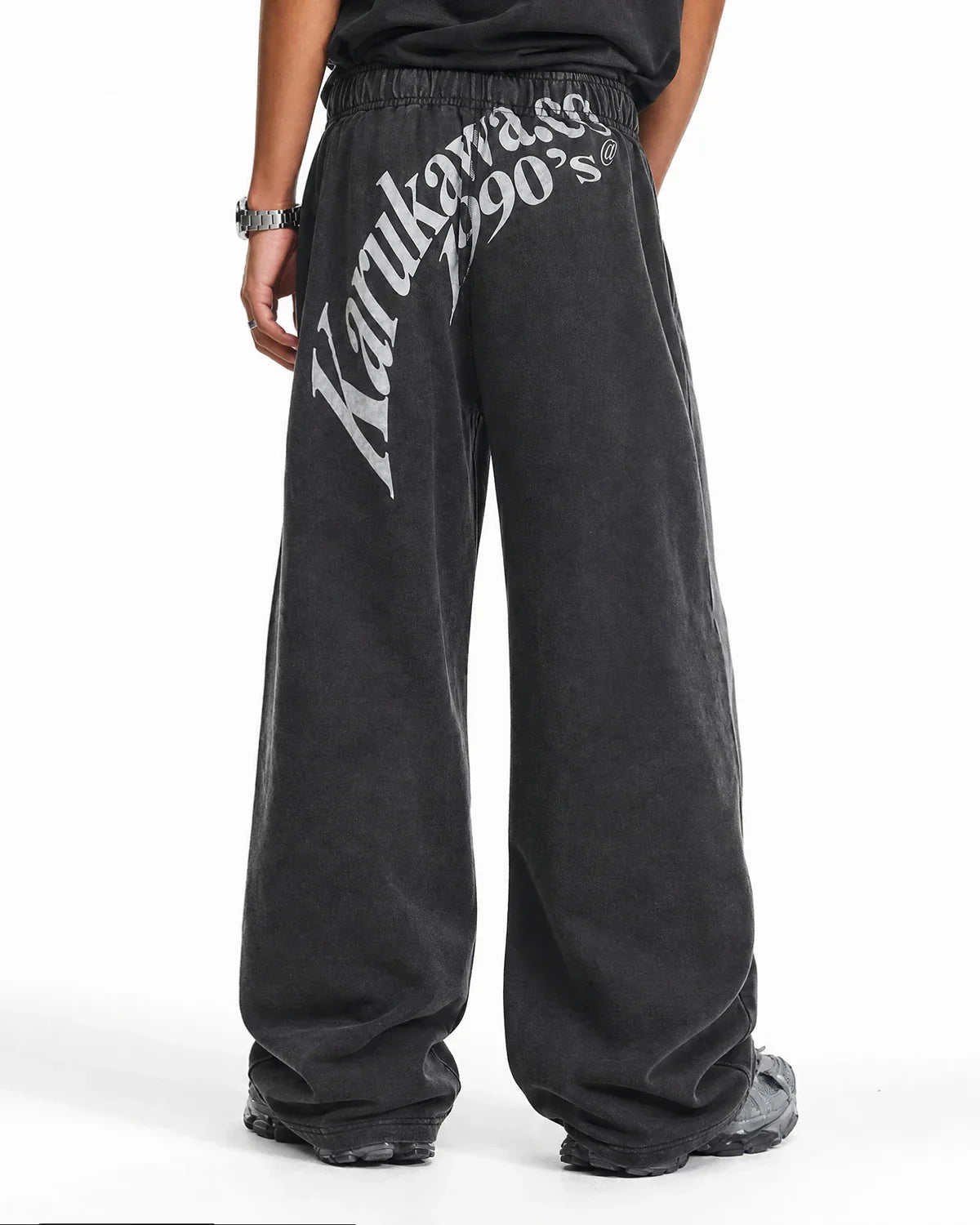Washed graphic wide-leg sweatpants by INFLATION Streetwear, featuring relaxed fit and stylish washed fabric detail.