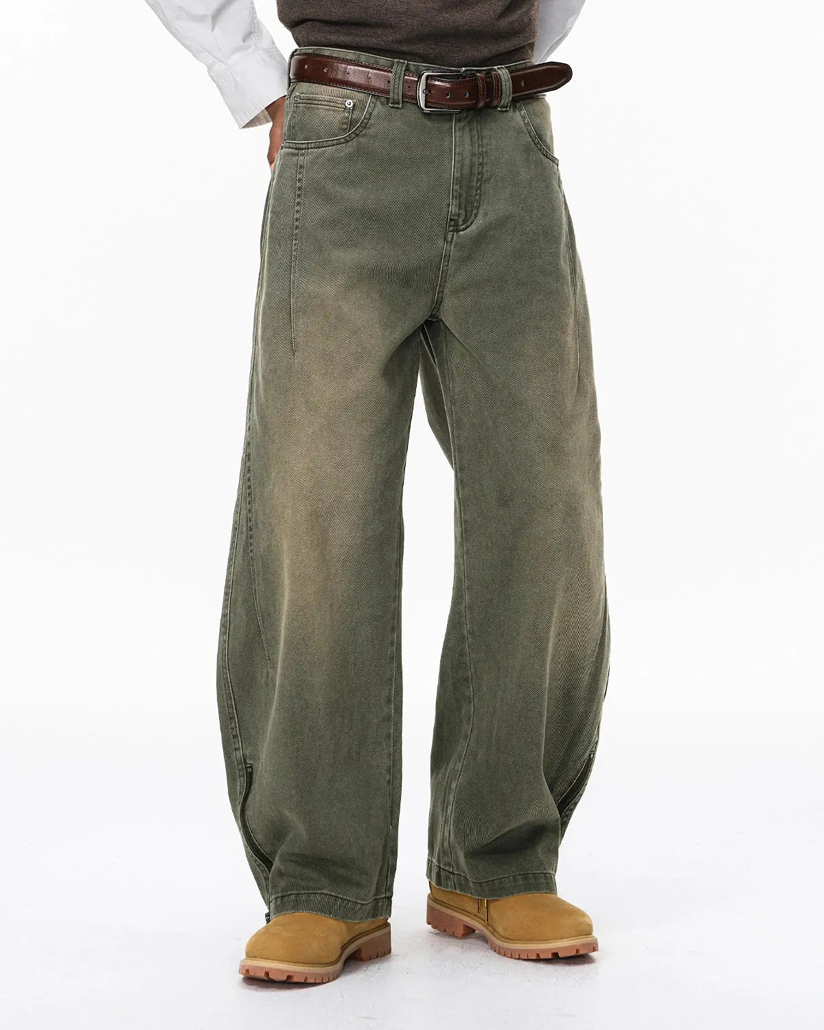 Retro acid wash baggy cargo pants by Flation Streetwear with multiple pockets and relaxed fit on model.