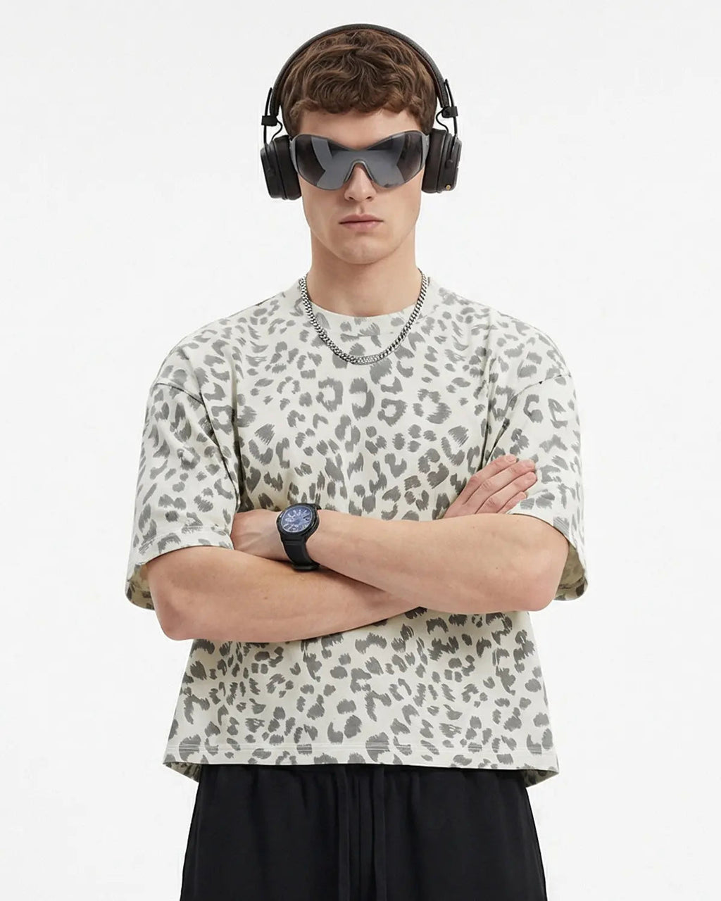 Leopard print boxy T-shirt by INFLATION, stylish streetwear top with bold animal pattern, short sleeves and relaxed fit.